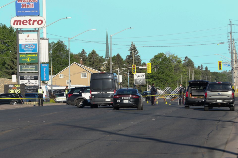 Second Line West is cordoned off from Farwell Terrace to Korah Road as Sault Ste. Marie Police Service investigate a fatal hit-and-run Thursday morning. A woman was pronounced dead at the scene. 