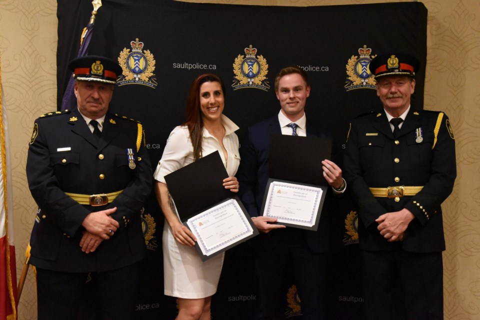 Paramedics Scott Benford and Deandra Franzisi receive recognition for their compassion in assisting a woman contemplating suicide. 