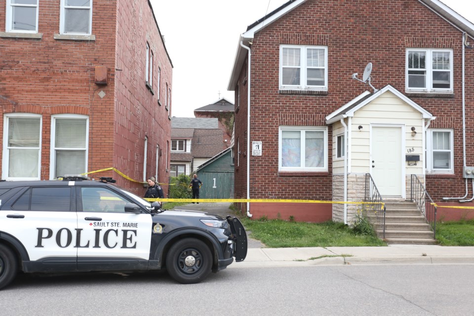 Police investigate a homicide that occurred on John Street on Sept. 7, 2023. Steven Jones was later charged with the murder of 22-year-old Taylor Marshall, who lived in the apartment in the house.