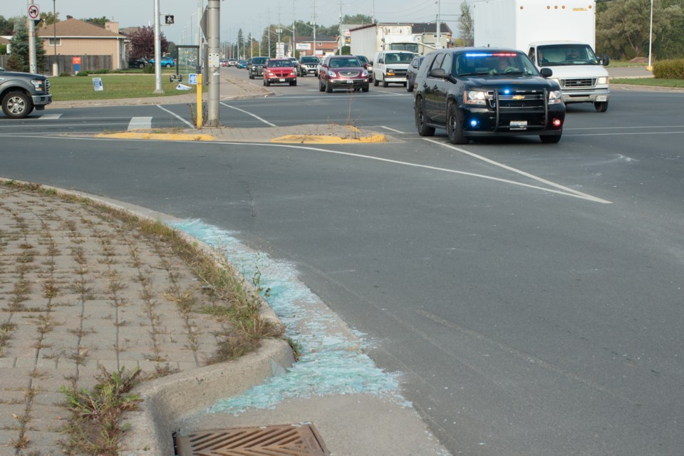 Glass fell out of a white Dodge pickup truck and shattered on Second Line West near Peoples road just after 9 a.m. Friday morning. Shortly after the incident, police blocked off one lane on Second Line West and some of the glass had been swept up. Jeff Klassen/SooToday


