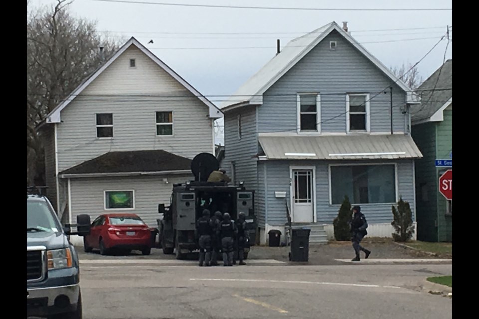 The Sault Ste. Marie Police Service's armoured vehicle sits at a home on St. Georges Avenue on Thursday, April 20, 2017. Jeffery Klassen/SooToday