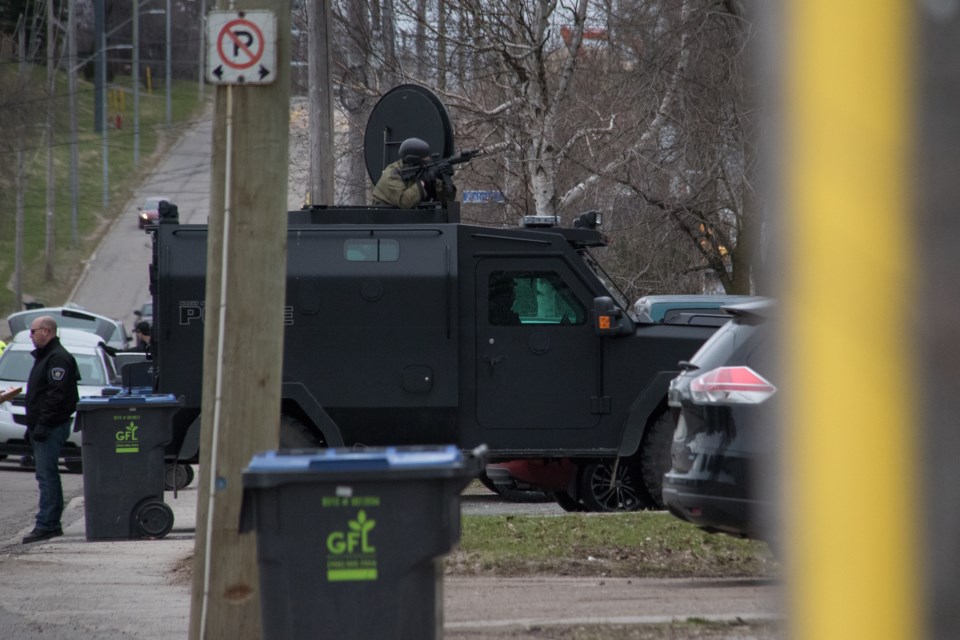An armed police tactical unit entered a home on St. Georges Avenue East Thursday morning in an incident that lead to at least one arrest. A member of the Emergency Services Unit held position in an armoured vehicle with a gun pointed at the home as other officers conducted operations inside. Jeff Klassen/SooToday