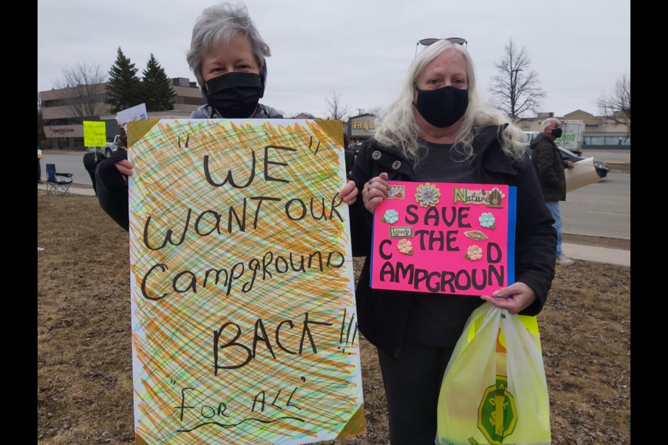 Guylaine Poitras and Karen White were among approximately 100 people who joined a rally on McNabb Street to protest city council’s February decision to close the Pointe Des Chenes campground, March 27, 2021. Darren Taylor/SooToday  