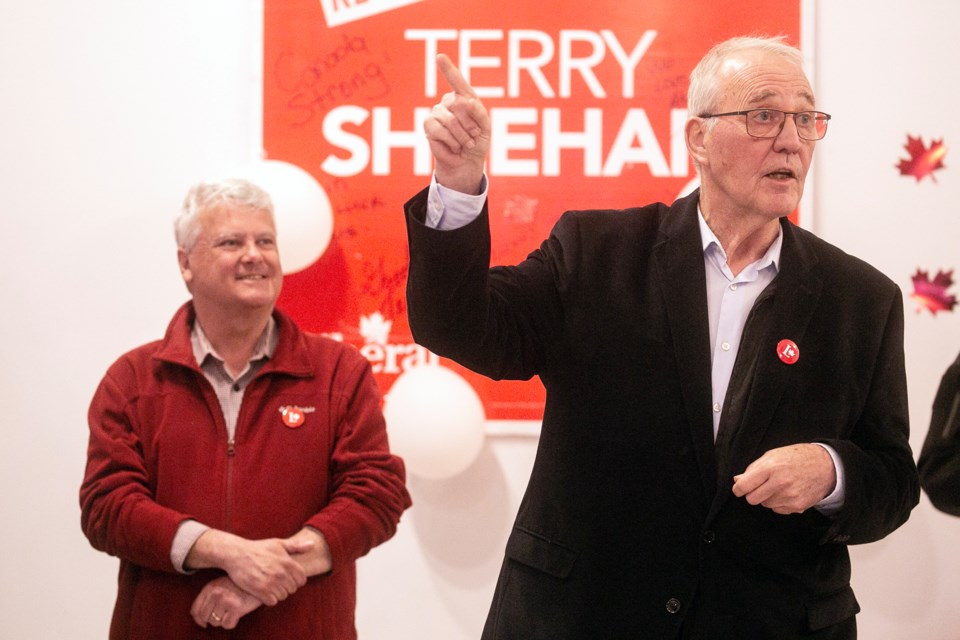 Bill Blair, most recently the federal Defence minister, speaks during a celebration in support of volunteers held at the headquarters for Terry Sheehan's re-election campaign on Monday. 