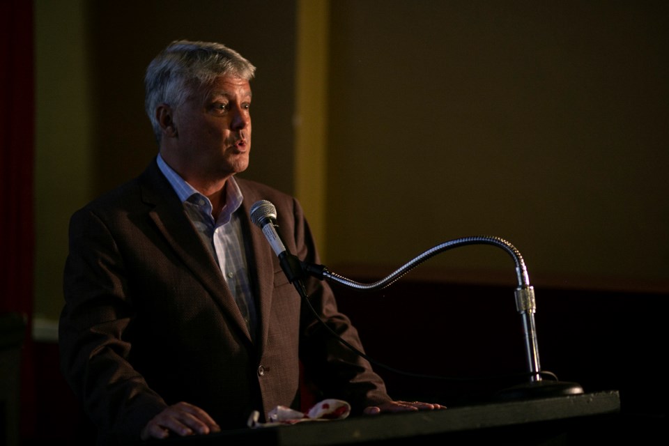 Liberal candidate Terry Sheehan speaks to supporters as results were still too close to call.