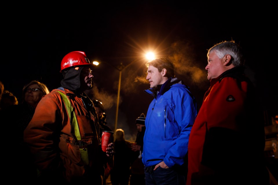 Matt Frolick stops to talk with Canadian Prime Minister Justin Trudeau and Sault MP Terry Sheehan this morning at Number 2 Gate at Algoma. Provided photo by Adam Scotti. March 14, 2018