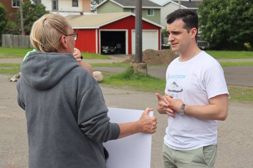 Ward 3 councillor Matthew Shoemaker meets with residents at his mayoral campaign launch Wednesday morning.