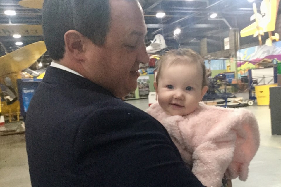 Mayor Christian Provenzano unwinds with Alice, youngest of his three daughters, after delivering his State of the City Address at Canadian Bushplane Heritage Centre on Thursday, Oct. 3, 2019. David Helwig/SooToday