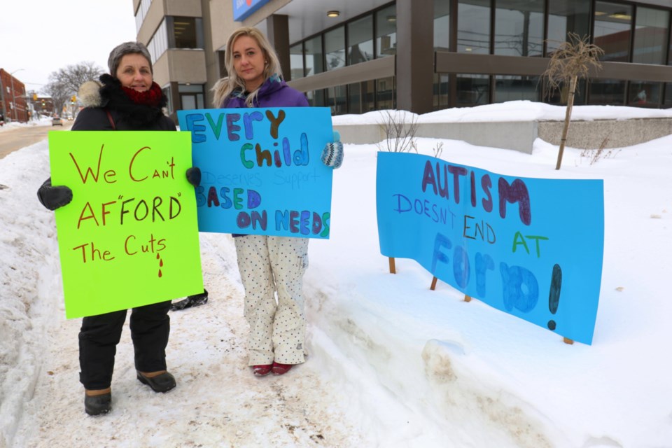 Ontario Autism Coalition regional coordinator Morgan Fiaschetti was joined by her mother, Diana McCartney, to protest changes to the province's autism program outside of MPP Ross Romano's office Thursday morning. James Hopkin/SooToday