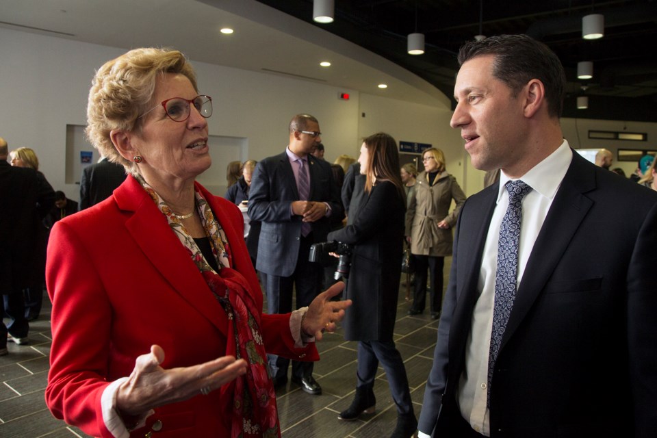 Kathleen Wynne, premier of Ontario, speaks with David Orazietti Jan. 26, 2017 during a funding announcement at Sault College. Formerly the MPP for Sault Ste. Marie, Orazietti is now the Dean of Aviation, Trades and Technology, Natural Environment and Business at Sault College. Kenneth Armstrong/SooToday