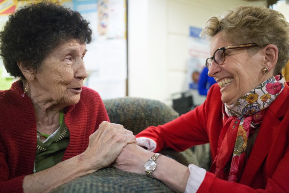 Virginia Suraci, a resident of the Finnish Resthome, speaks with premier Kathleen Wynne at a campaign event for the upcoming Sault Ste. Marie byelection. Kenneth Armstrong/SooToday