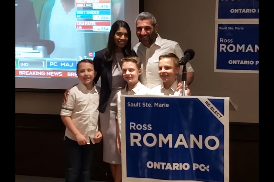 Ross Romano, with wife Heather and three sons, greet supporters at Quattro