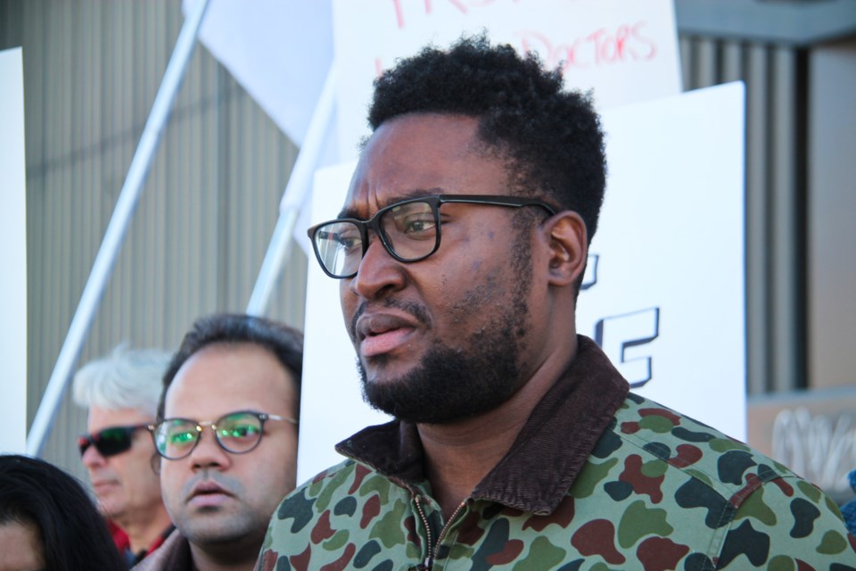 Dr. Aaron Smith, a physician from Trinidad and Tobago now living in Sault Ste. Marie and awaiting a license to practice family medicine in Ontario, joined a rally calling on Sault MPP Ross Romano and the provincial government to fix the family doctor shortage in the city, March 1, 2024.