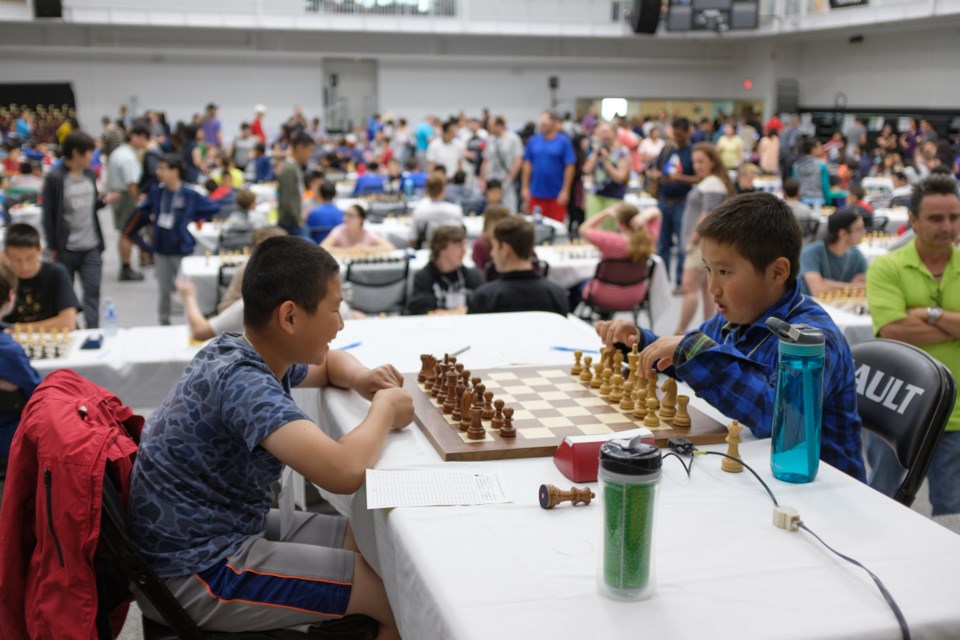 (From left) Youhe Huang,9, and Max Chen, 10, at the 2017 Canadian Youth Chess Championships at Sault College on Monday. Jeff Klassen/SooToday