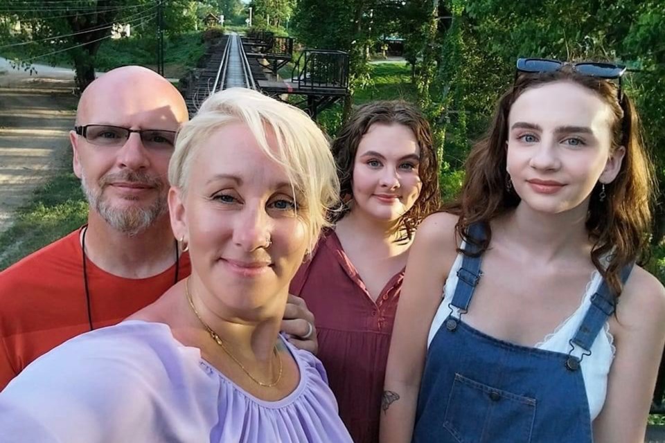 Marnie Scott (second from left) shot this family selfie yesterday at the famous Kwai River bridge