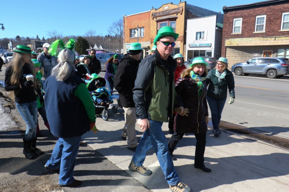 Roughly 100 people took part in Sault Michigan's first annual St. Patrick's Day Parade on Saturday. James Hopkin/SooToday