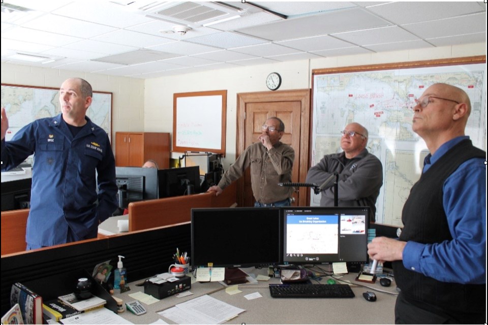 Coast Guard and Sugar Island Leadership discuss ice conditions in the St. Marys River this winter. Left to Right: CAPT Marko Broz, Sugar Island Township Supervisor Rick Roy, Sugar Island Township Treasurer Frank Handziak, and Vessel Traffic Service Director Mark Gill. Photo provided