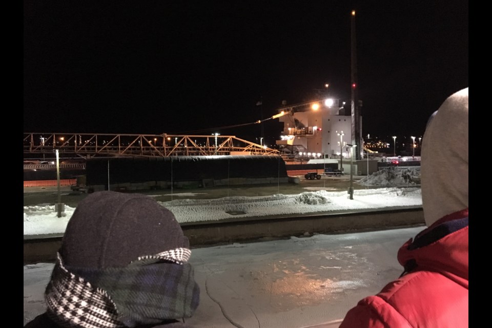 American Century passes through the Soo Locks just after midnight, March 25, 2018. Darren Taylor/SooToday