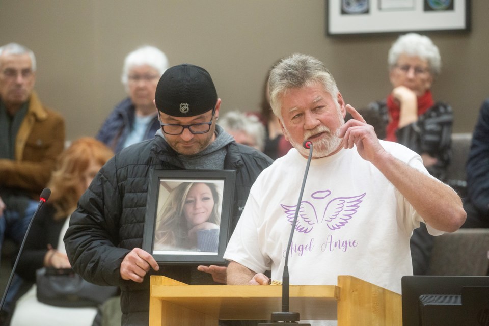 Brian Sweeney, who lost his daughter Angie last week to intimate partner violence, addresses Sault Ste. Marie City Council on Monday with his son Brian Jr. by his side.