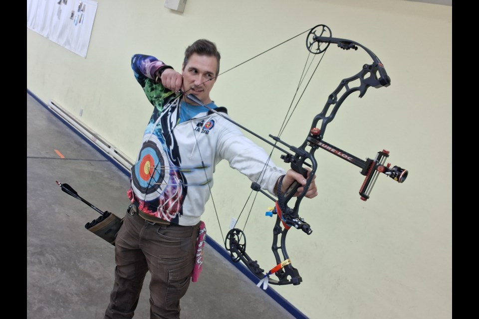 Jacob McEachern with the hunting-ready equipment he used while taking a gold medal at the provincial championships in January.