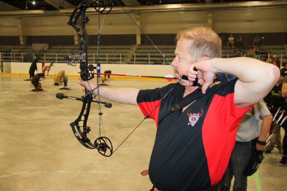 Tim Dodds, Sault North Archery Club vice president, takes aim during the club’s 4th annual 3D Spring Fling held at Rankin Arena, April 27, 2019. Darren Taylor/SooToday  