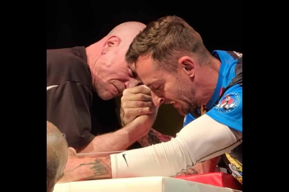 Sault arm wrestler Marty Dimma, at left, competes with Nova Scotia’s Will Sarty at the 2023 Canadian Armwrestling Championship.