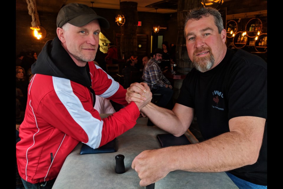 Marty Dimma, a local auto mechanic, and Cory Burke, a Sault College skilled trades instructor and Iron Workers Local 786 member, have been involved in arm wrestling for over 20 years. The Whisky Barrel Arm Wrestling Competition was held at the Gore Street pub April 13, 2019. Darren Taylor/SooToday