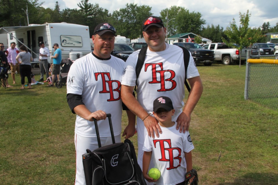 Brother in-laws Ryan Brown, Peter Colemen and his son Hudson Coleman from the 'A' final winning Team Bellerose. Chris Dawson for SooToday