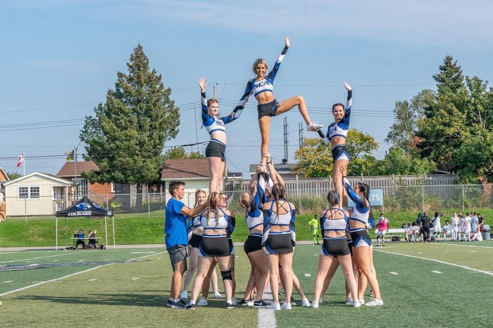 cheerleading coach cougars members cheer signals college sootoday sault text message