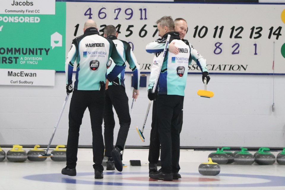 Team Jacobs celebrating following the final of the 2022 Northern Ontario Curling Association men's playdowns at the Community First Curling Centre on Feb. 13, 2022.