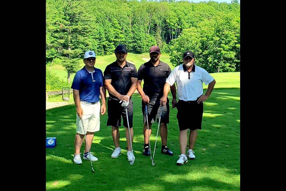 Don Martone (right) is pictured with Frank Kucher, Lucas Bordin and Mark Disano