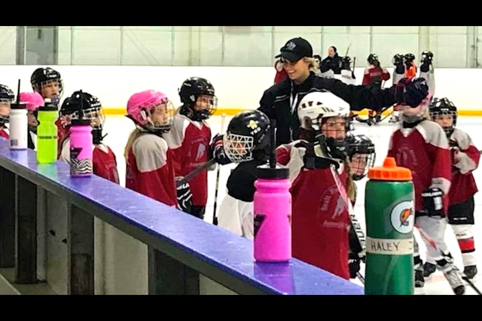 Brianne Veale works with girls enrolled in her Northern Elite Female Hockey Academy. photo supplied