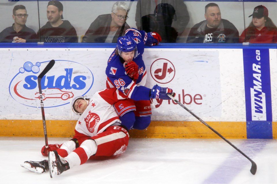 Players collide during Game 3 of the playoff series between the Soo Greyhounds and Kitchener Rangers, played April 23, 2018 at the Aud in Kitchener. Kenneth Armstorng/SooToday