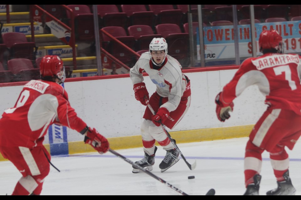 2020 first round pick Bryce McConnell-Barker (white jersey) in action during the Soo Greyhounds 2021 training camp.