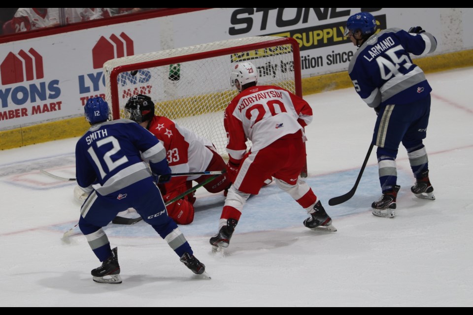 Ryan Smith of the Sudbury Wolves beats Soo Greyhounds goaltender Samuel Ivanov in a game at the GFL Memorial Gardens on Oct. 9, 2021.