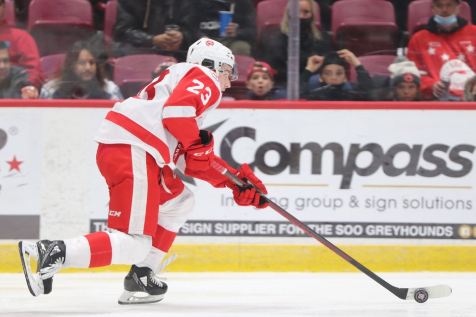 Soo Greyhounds forward Rory Kerins moves the puck up the ice during a game against the Guelph Storm on Nov. 5, 2021
