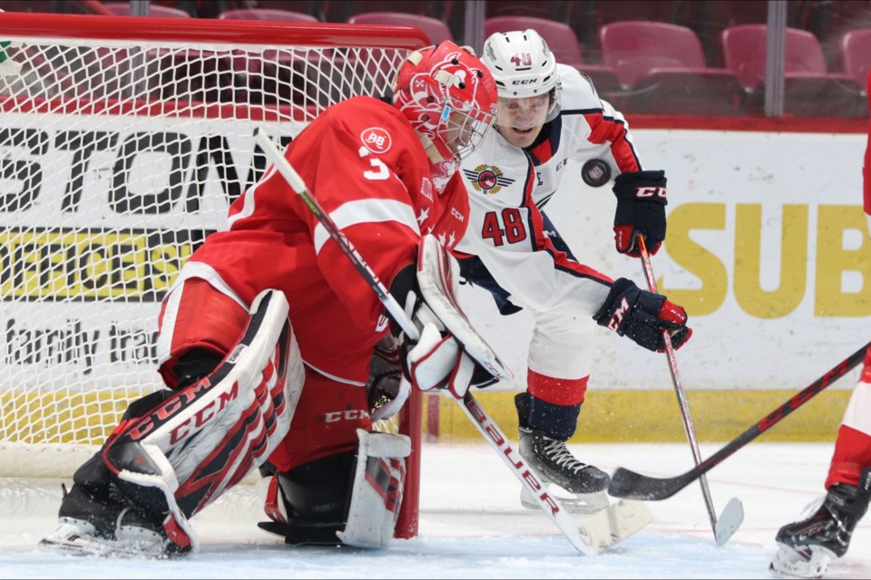 Soo Greyhounds goaltender Tucker Tynan keeps his eye on the puck in a game against the Windsor Spitfires at the GFL Memorial Gardens on Jan. 8, 2022.