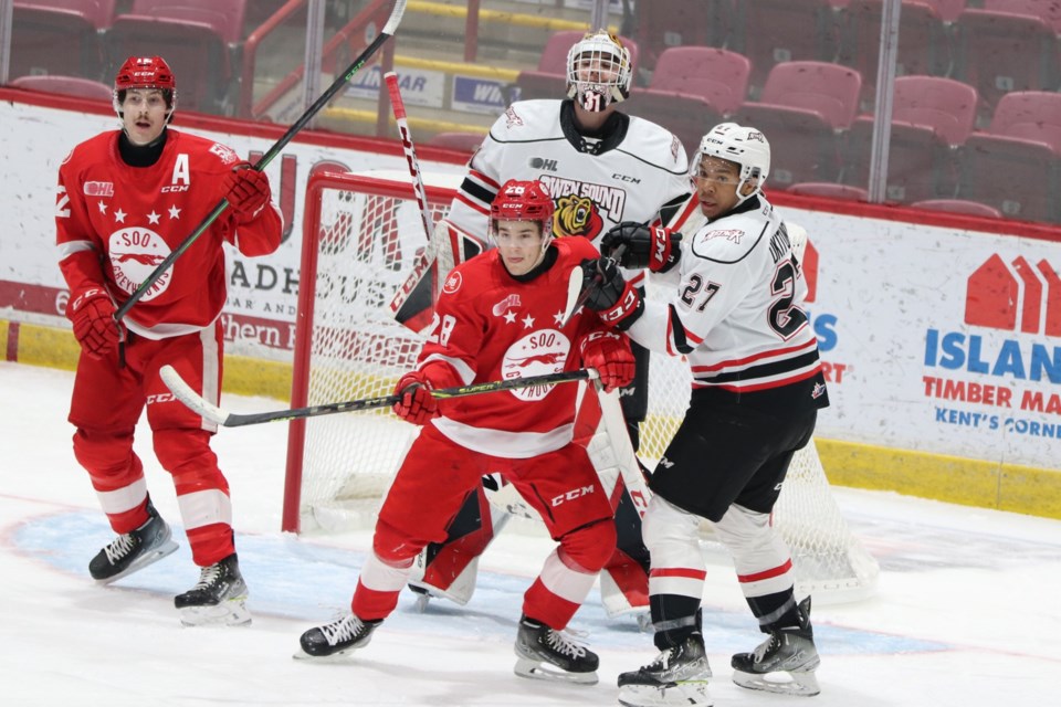 A crowded crease during action between the Soo Greyhounds and Owen Sound Attack at the GFL Memorial Gardens on Jan. 16, 2022.