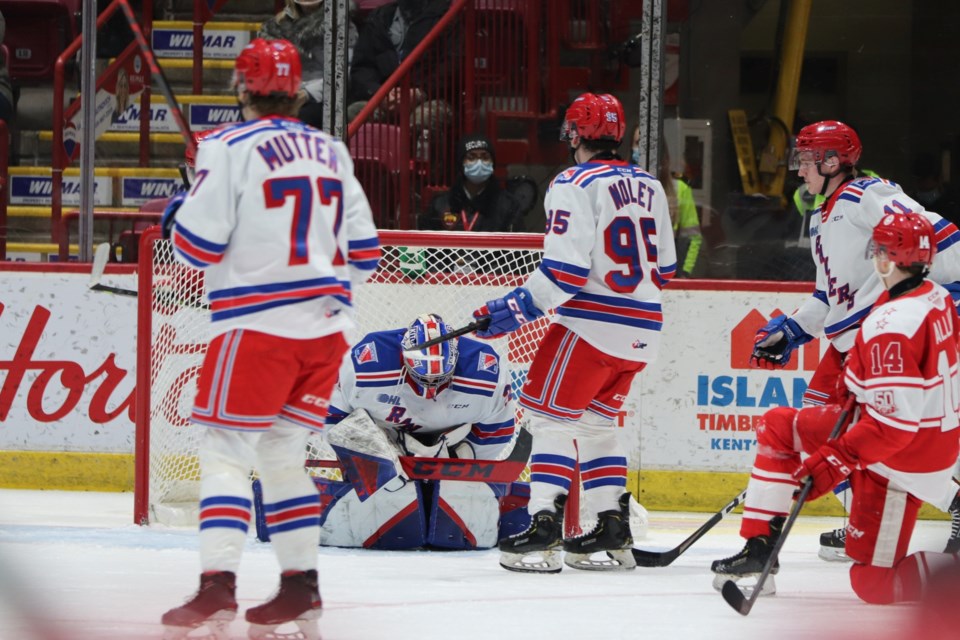 Kitchener Rangers goalie Jackson Parsons makes a save against the Soo Greyhounds in a game at the GFL Memorial Gardens on March 11, 2022.