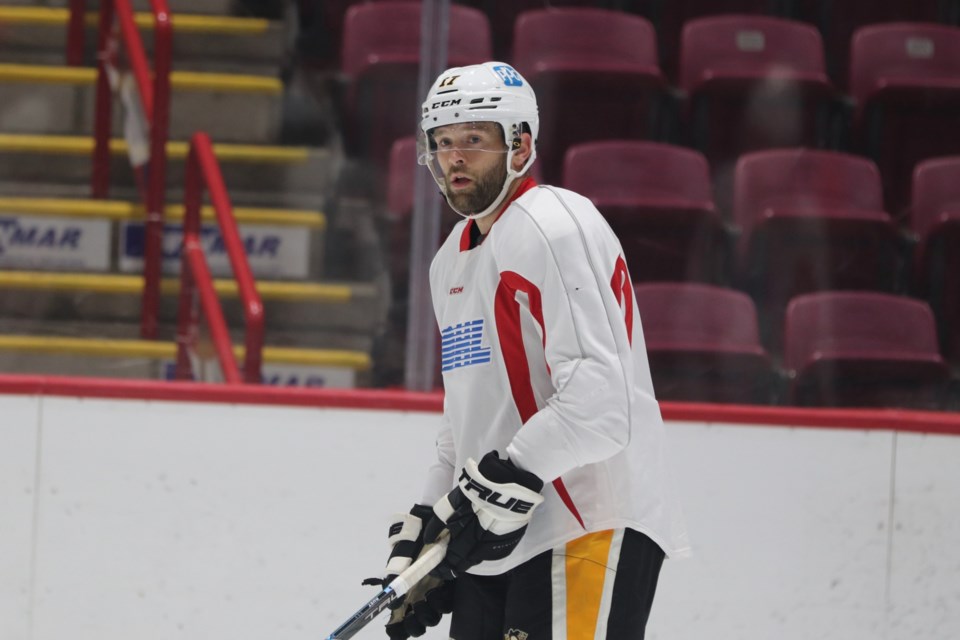 Pittsburgh Penguins forward Bryan Rust on the ice with Soo Greyhounds hopefuls during training camp on Sept. 1, 2022.