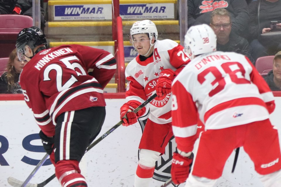 Soo Greyhounds forward Kalvyn Watson looks to make a play during a game against the Guelph Storm at the GFL Memorial Gardens on Nov. 4, 2022.