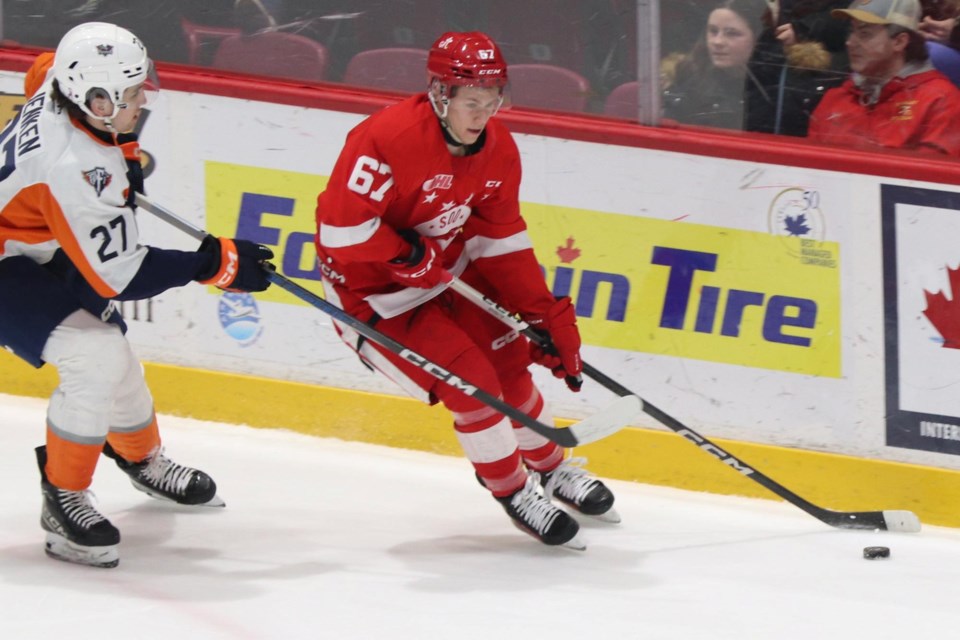 OHL action between the Soo Greyhounds and Flint Firebirds at the GFL Memorial Gardens on March 22, 2024.