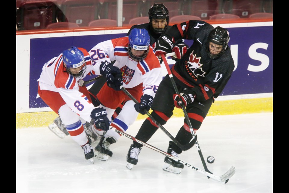 Team Czech Republic and Team Canada Black players fight for the puck during their 2016 World Under-17 Hockey Challenge preliminary round game played Oct. 31, 2016 at the Essar Centre in Sault Ste. Marie. Team Canada went on to defeat Team Czech Republic by a score of 5-4. Kenneth Armstrong/SooToday