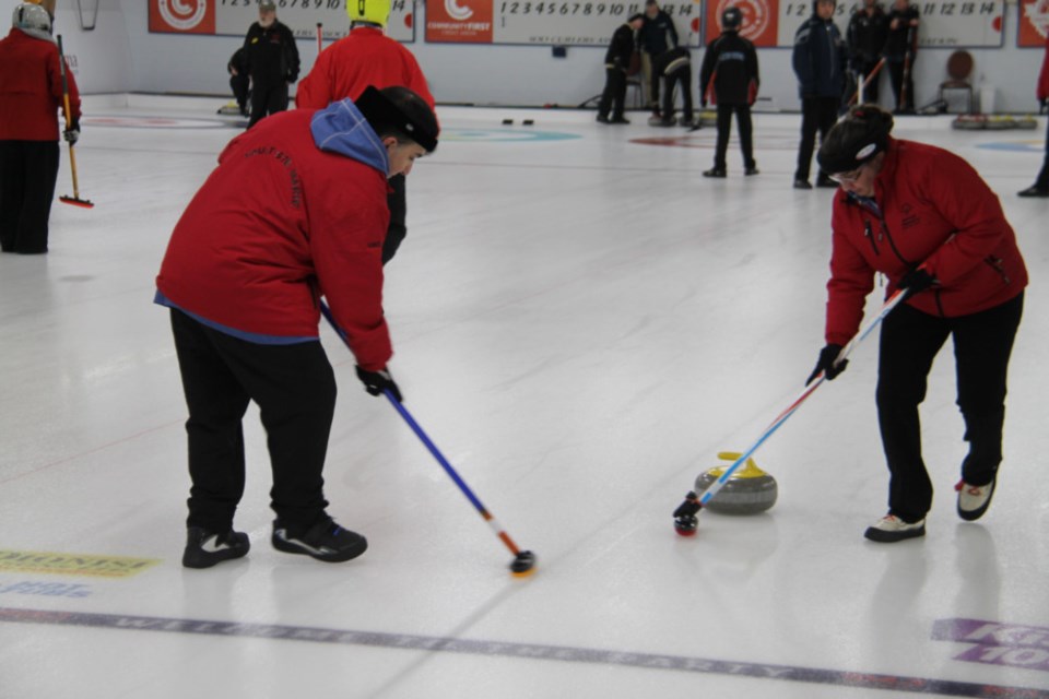 Special Olympics curlers Vince Coccimiglio and Kristen Bonenfant of Sault Ste. Marie in action at the Community First Curling Centre in the 2019 Special Olympics Ontario Provincial Winter Games, Feb. 2, 2019. Darren Taylor/SooToday