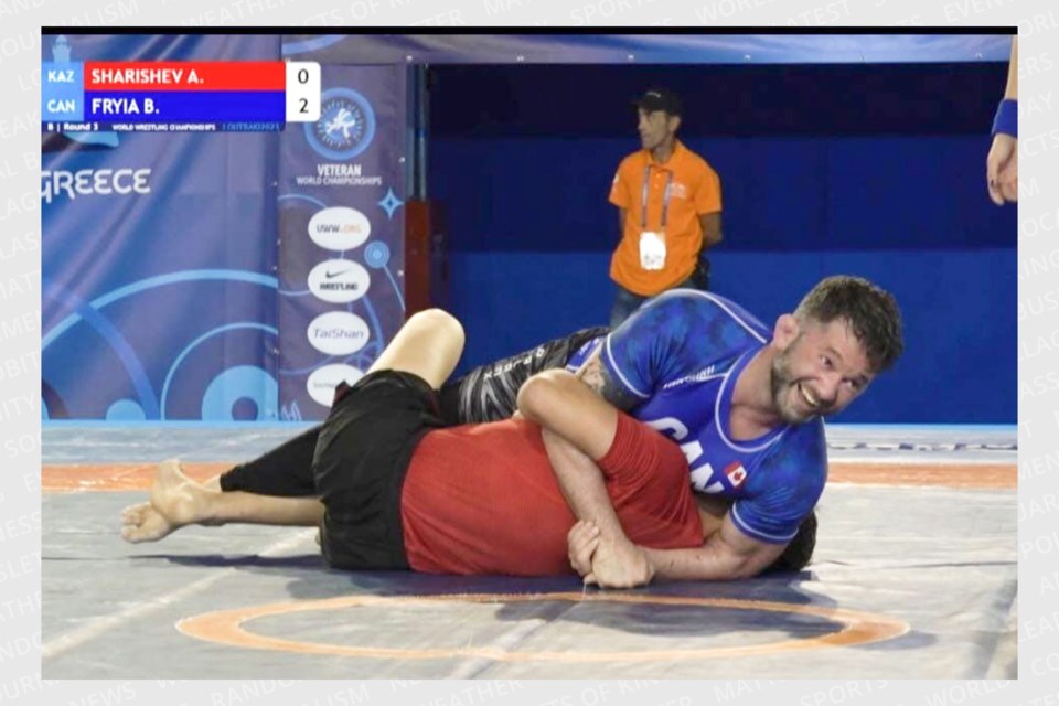 Steel City MMA owner and coach Brent Fryia places a hold on Akmhat Sharisev of Kazakhstan during the third round of the Veterans Grappling World Championships in Loutraki, Greece Oct. 14. 