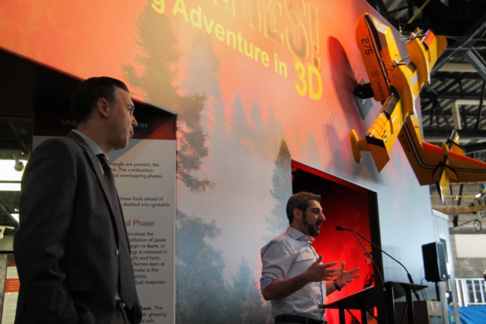 Sault MPP Ross Romano, at podium, announces funding for the Canadian Bushplane Heritage Centre, with Brian Bubinas, the centre’s curator, at left, March 1, 2019. Darren Taylor/SooToday