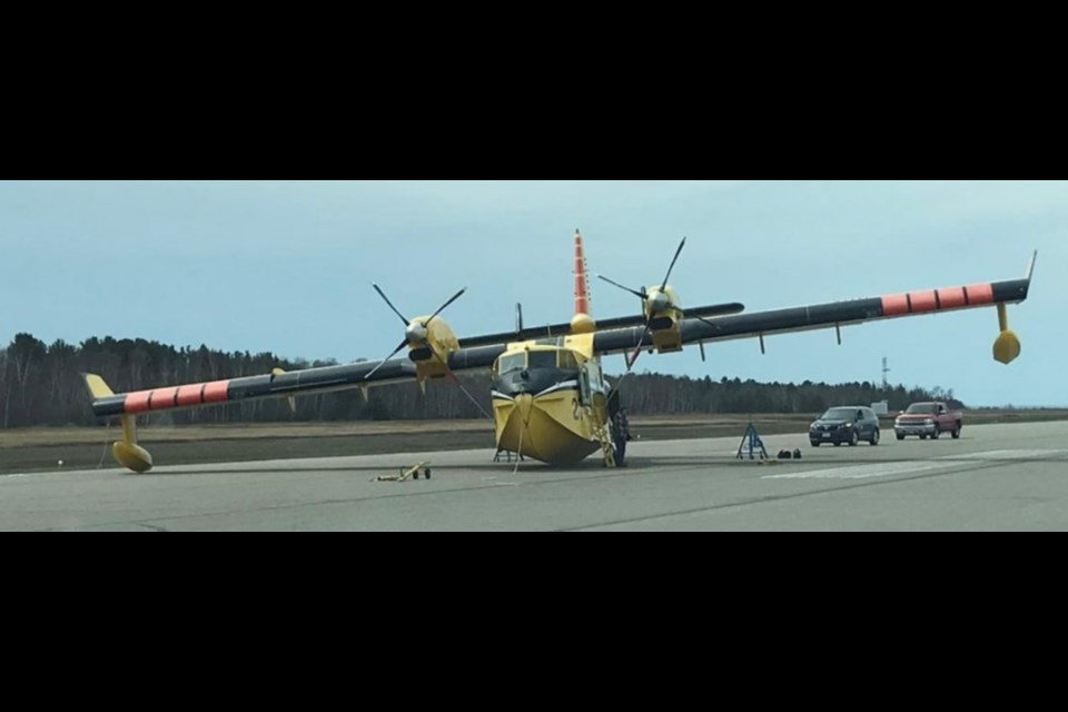 Ontario Ministry of Northern Development, Mines, Natural Resources and Forestry Canadair CL-415 water bomber after landing with unretracted landing gear on May 2, 2021