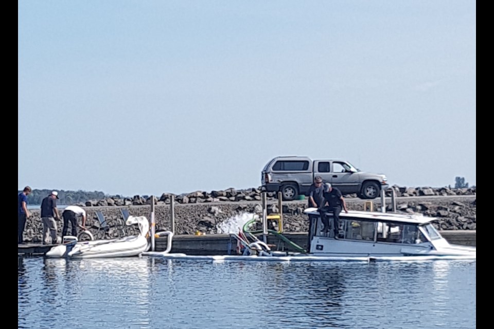 This boat sank and was refloated when it was launched at the Bellevue Marina in the afternoon of Wednesday, July 11. Reader submitted photo