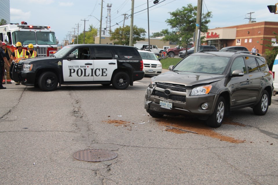 Police redirected traffic after a two-vehicle collision at the corner of Bay and Brock Streets Monday afternoon, August 29, 2016. Darren Taylor/SooToday