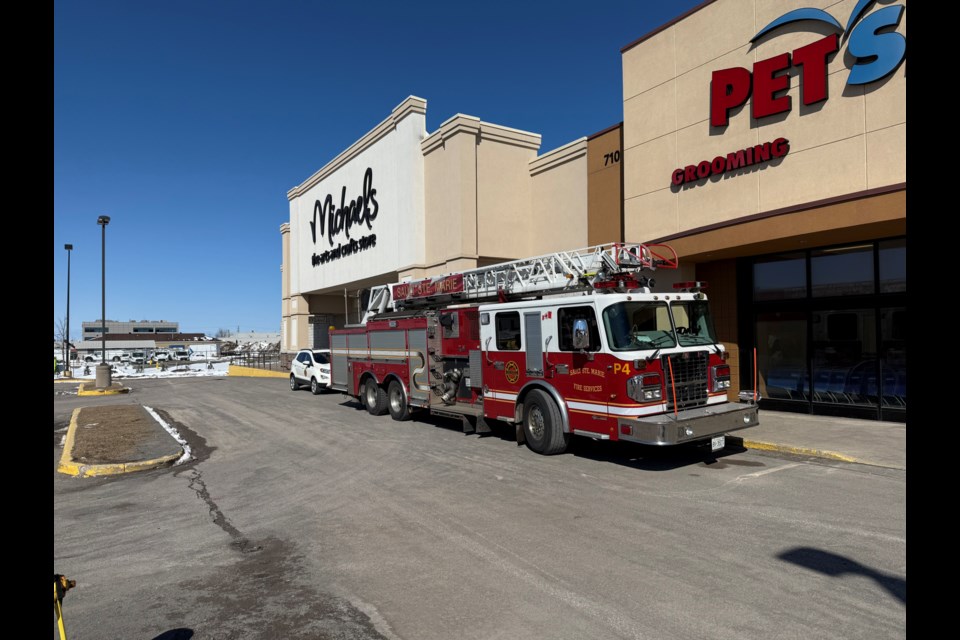 Firefighters were called back to the scene of a Monday morning fire at Michael's after alarms were triggered again on Tuesday.